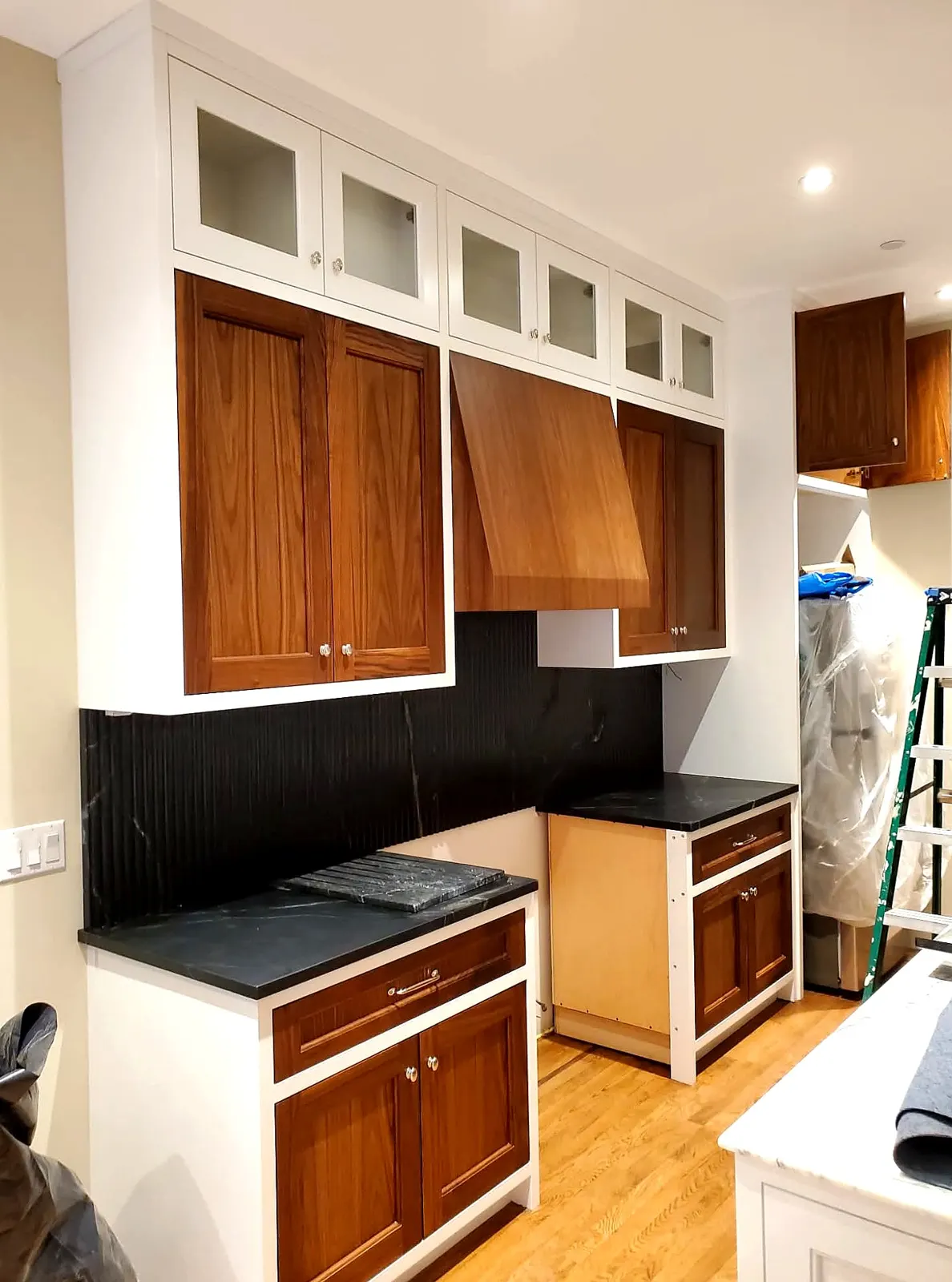 Kitchen Remodel · Walnut Cabinetry & Marble Counters